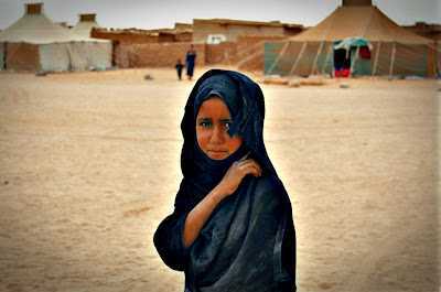  Foto: Para m, que la hice, es una vctima. Una nia refugiada en un infierno, que es lo que quiere decir Hammada, como llaman a Tinduf, porque no puede vivir en su tierra ocupada. Para otros es una